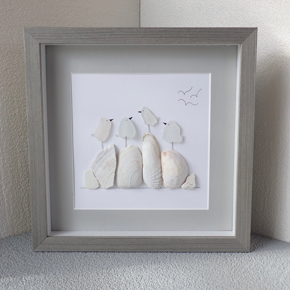 
                  
                    gray frame white sea glass birds on rocks picture home decor
                  
                