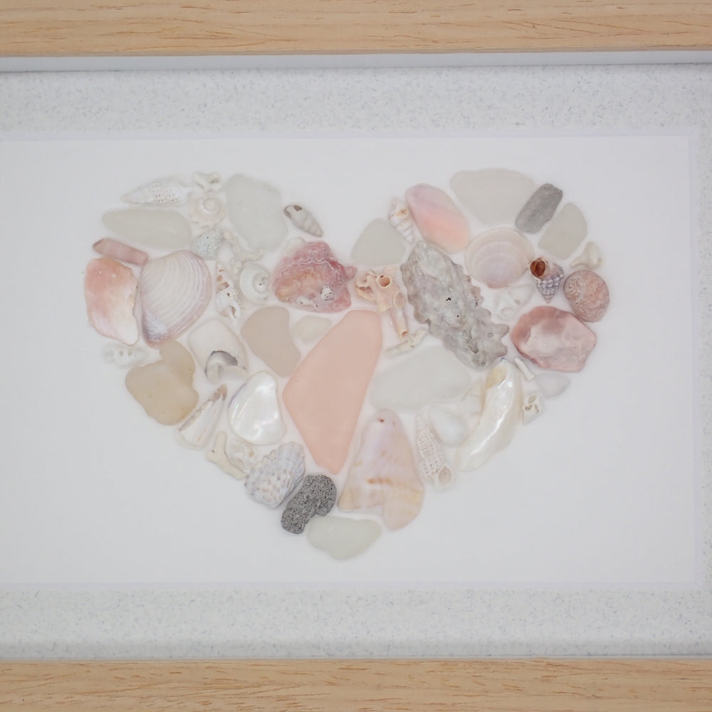 sea glass art features a seashell mosaic composed of shells, sea glass, &amp; coral