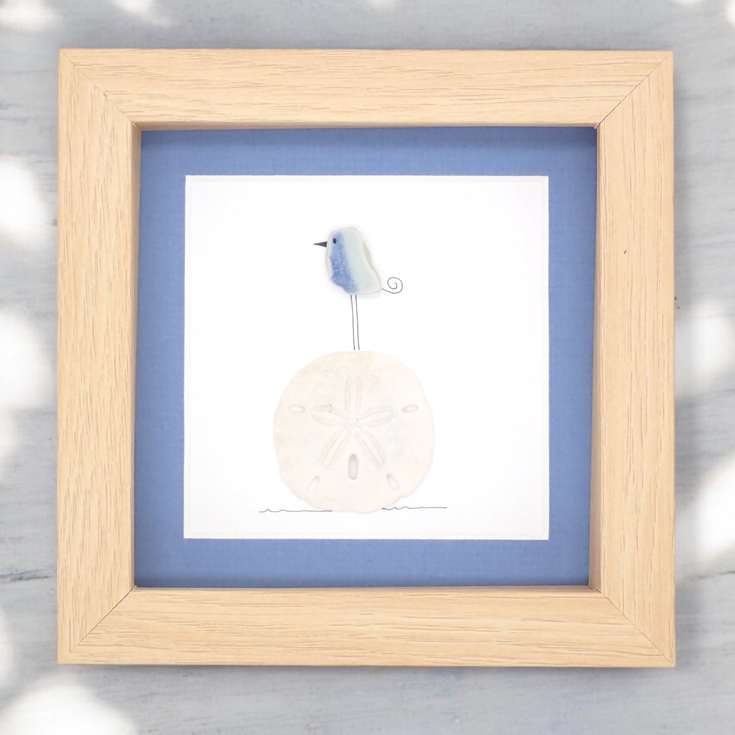 Sea Glass Bird On A Sand Dollar Picture